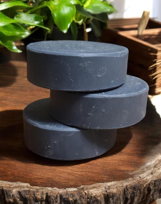 3 blue round shampoo bars stacked